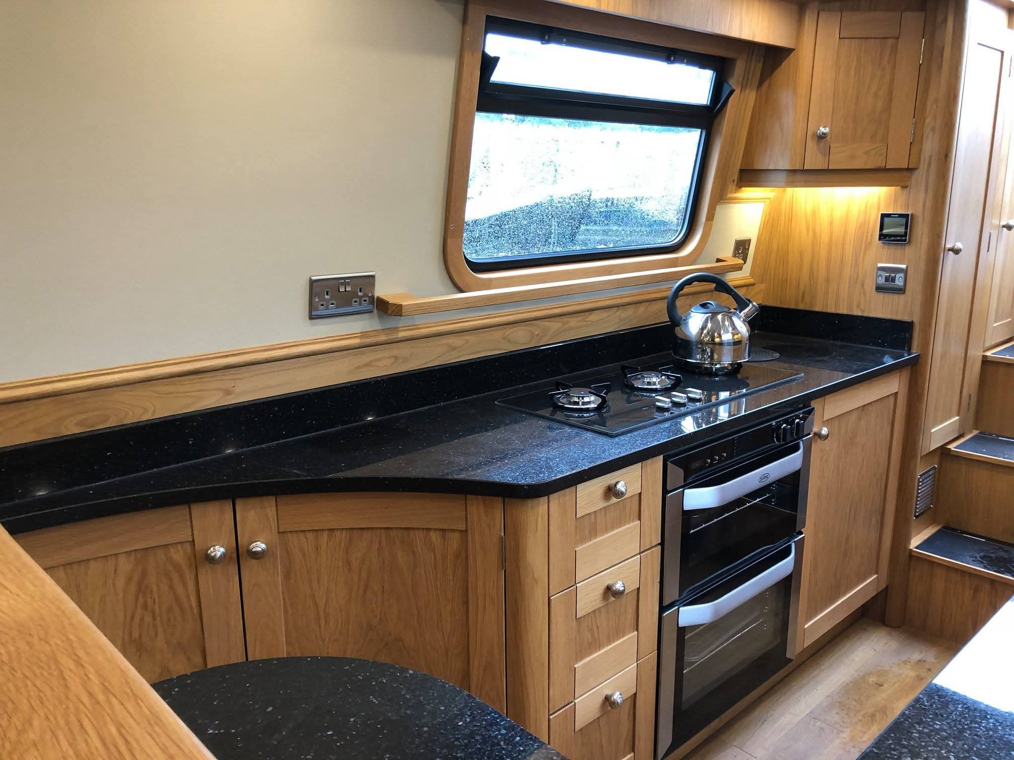 Narrowboat Galley Fit-Out and Storage by Midway Boats Group.